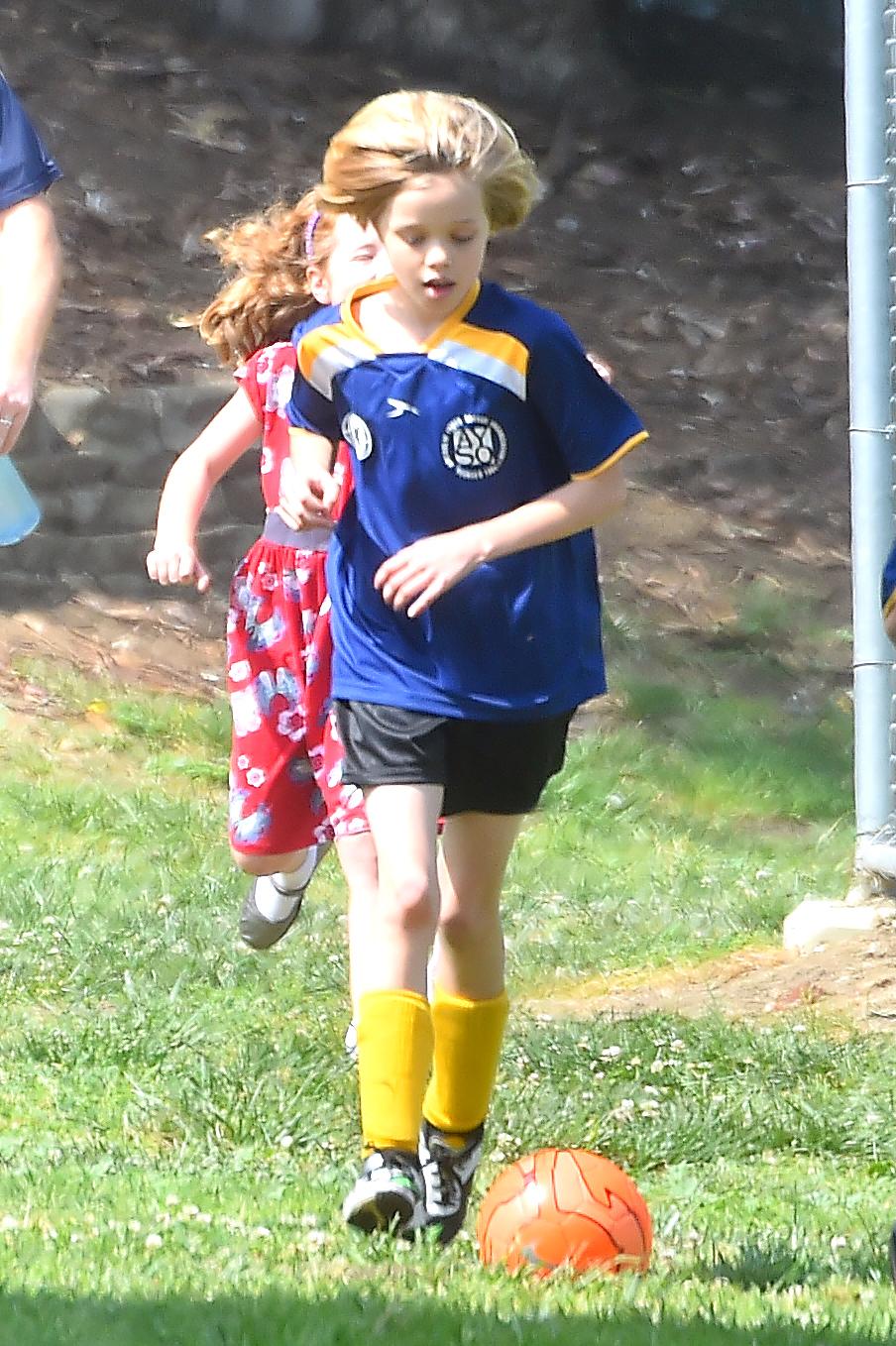 Shiloh and Zahara Jolie Pitt are accompanied by a bodygaurd to their Soccer Game in Studio City