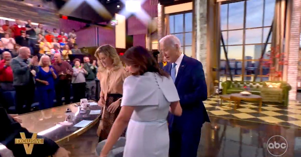 the view hosts backlash joe biden interview kissing
