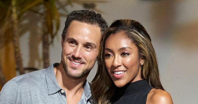 Tayshia Adams Wearing a Black Dress With Zac Clark