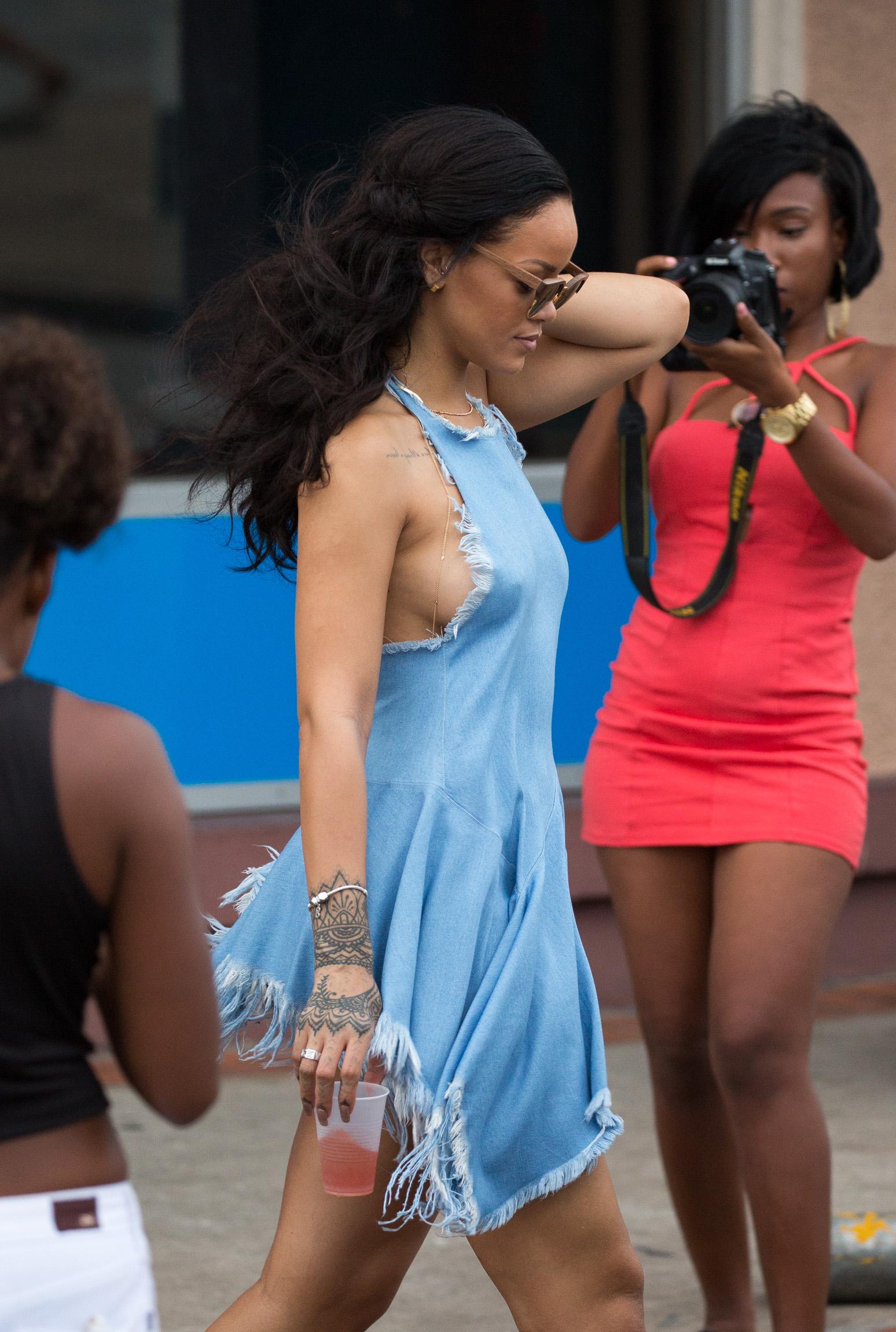 Rihanna Bares Serious Side Boob in Denim Ensemble