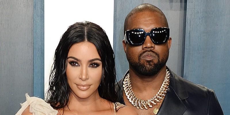 Kim Kardashian Wearing a Beige Dress With Kanye West In Sunglasses