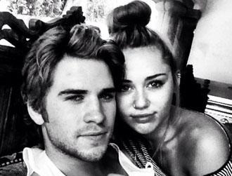 Miley cyrus liam hemsworth july11 m.jpg