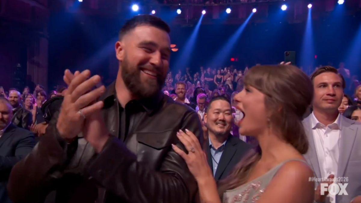 Photo of Taylor Swift and Travis Kelce were talking about something 'unreal' during the 2026 iHeartRadio Music Awards, a lip reader claimed.