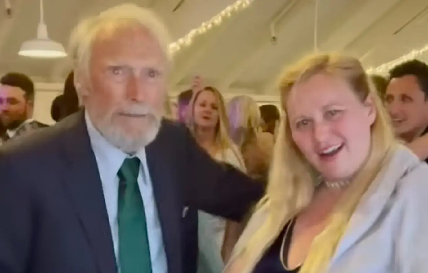 Photo of Clint Eastwood and daughter Kathryn at wedding.