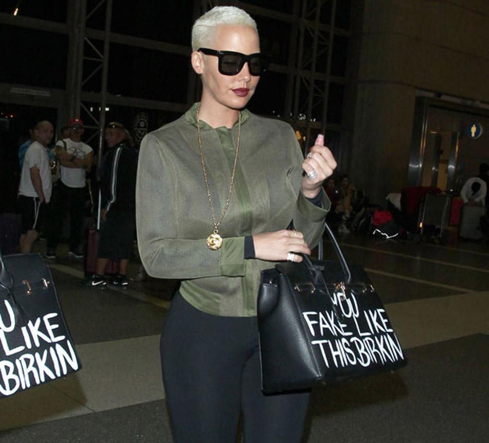 Is Amber Rose's bag aimed at the Kardashians? Reads 'You fake like this  Birkin' - Mirror Online