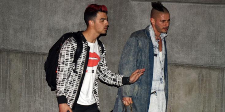 joe jonas frowns looks sad blocked ocars after party