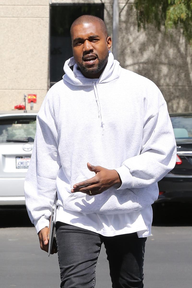 Kanye West arrives at the studio in his new ride