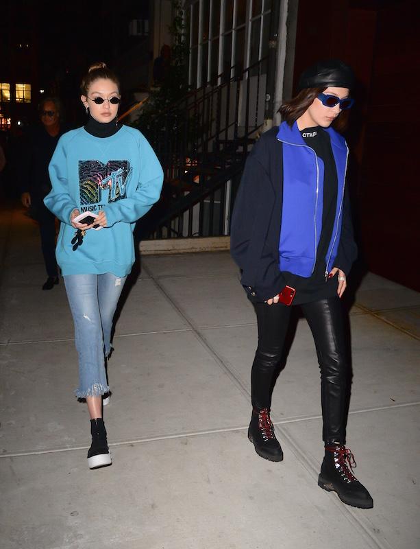 Gigi Hadid, Bella Hadid and Mohamed Hadid and Zayn Malik coming in and out of dinner in soho