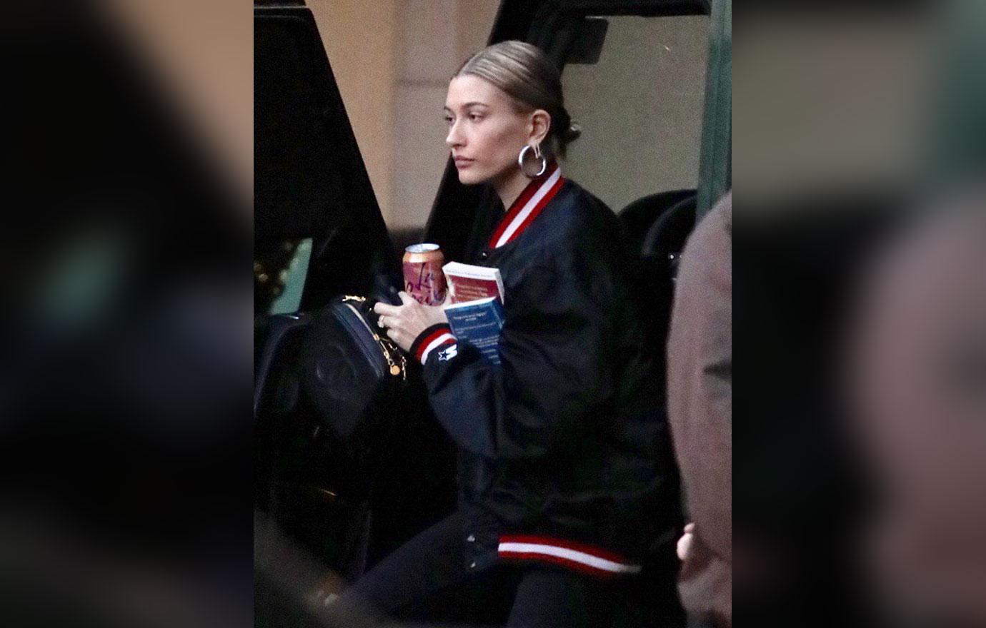 Hailey Baldwin seen with some books solo