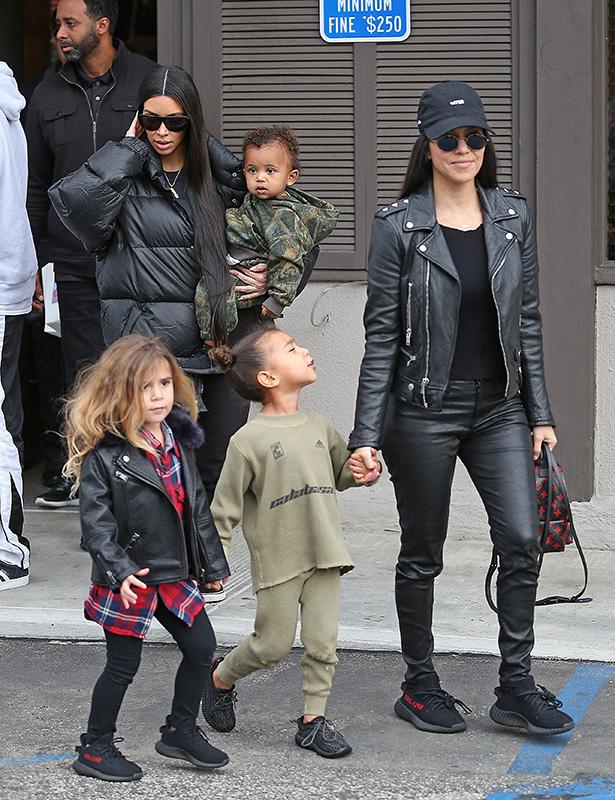 Kardashian sisters Kim and Kourtney join Kanye West and the kids for dinner