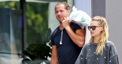 *EXCLUSIVE* Margot Robbie and husband Tom Ackerley take their rescue dog “Boo Radley” for a walk