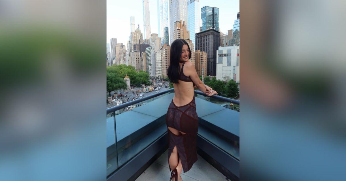 image of Charli D’Amelio stunned fans in a daring backless dress while celebrating her 22nd birthday.