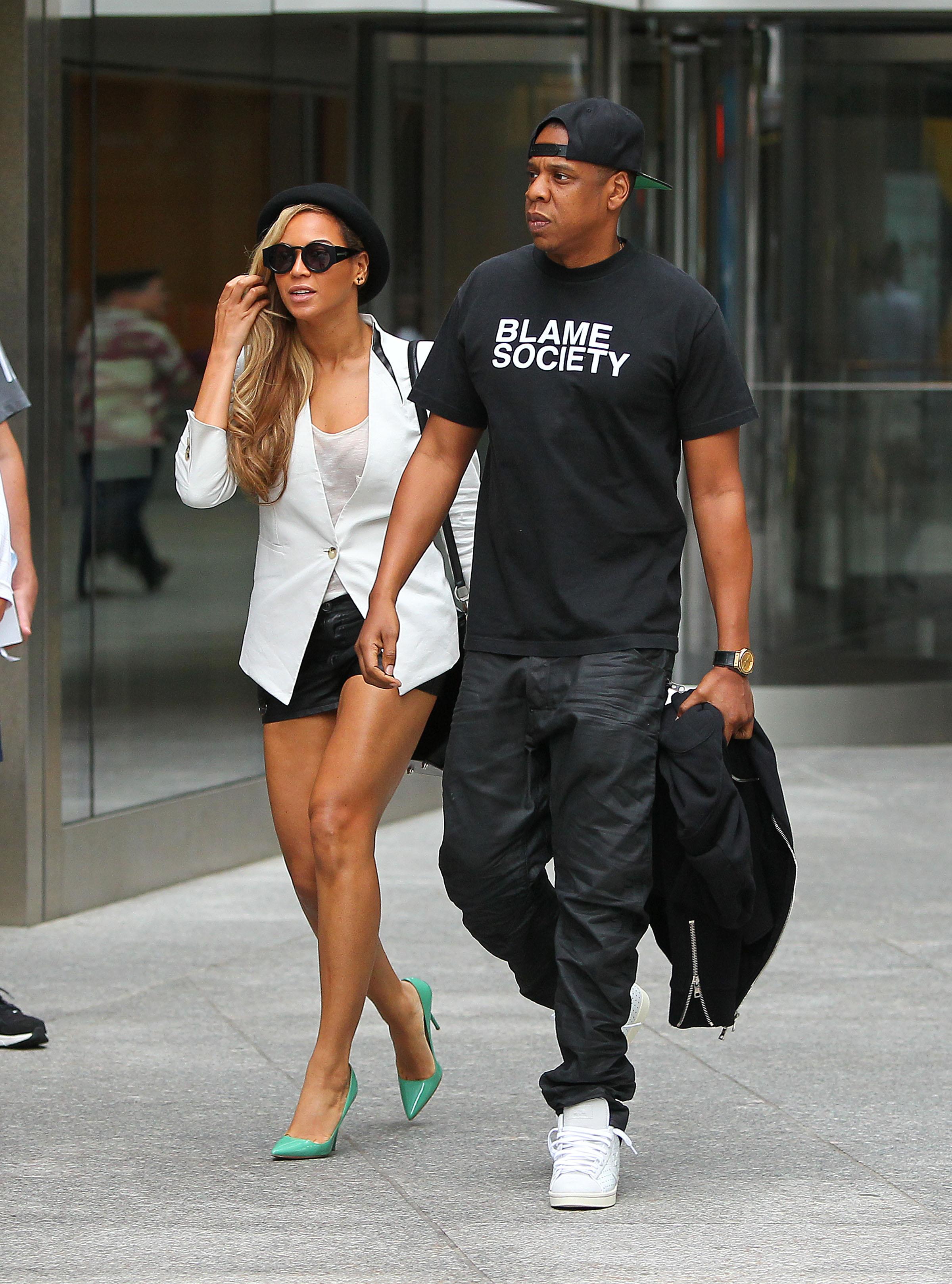 Jay Z and Beyonce leave a movie theater in NYC