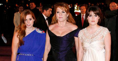 image of princesses beatrice and Eugenie and Sarah ferguson