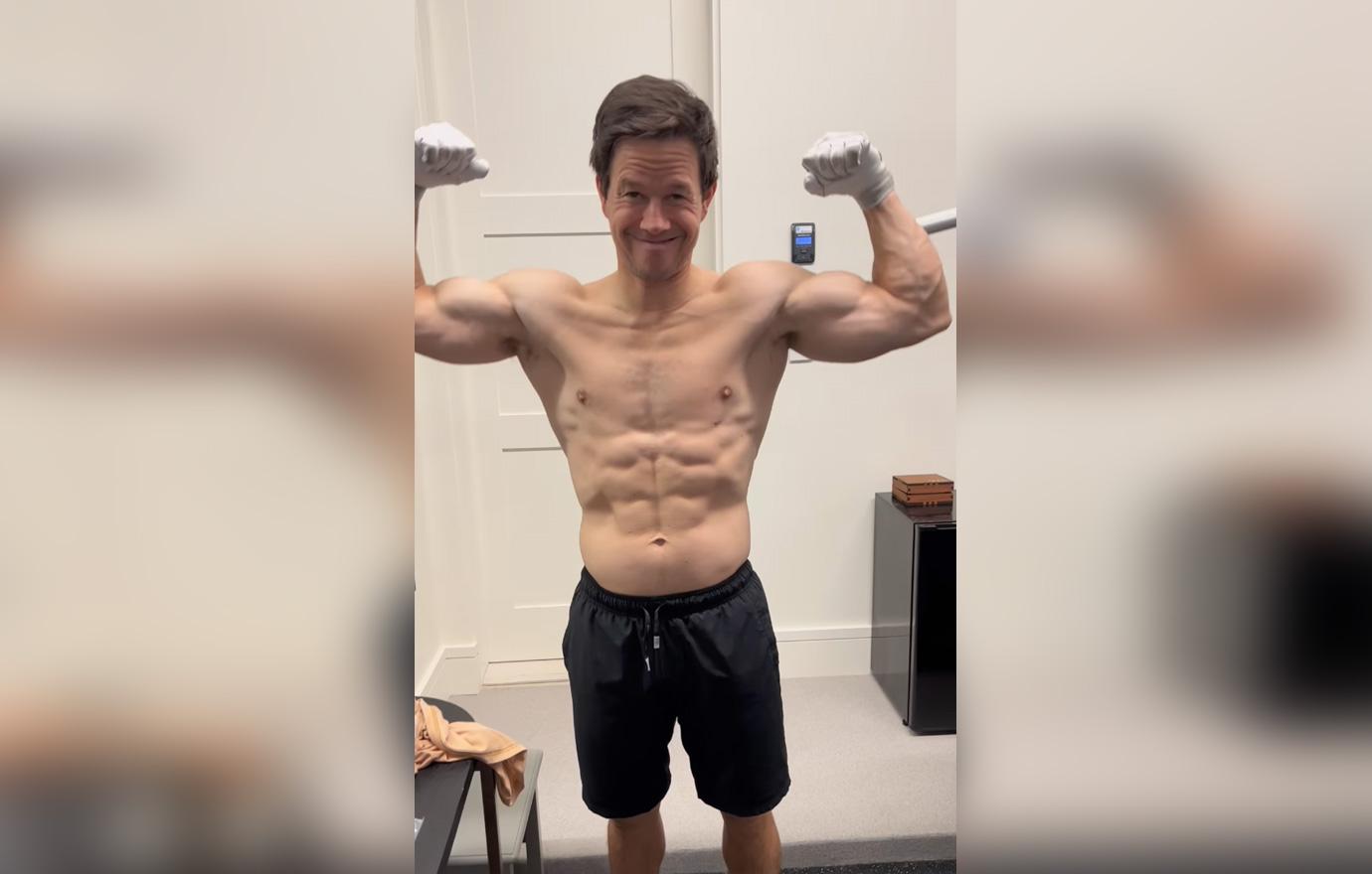 mark wahlberg shows off muscles workout