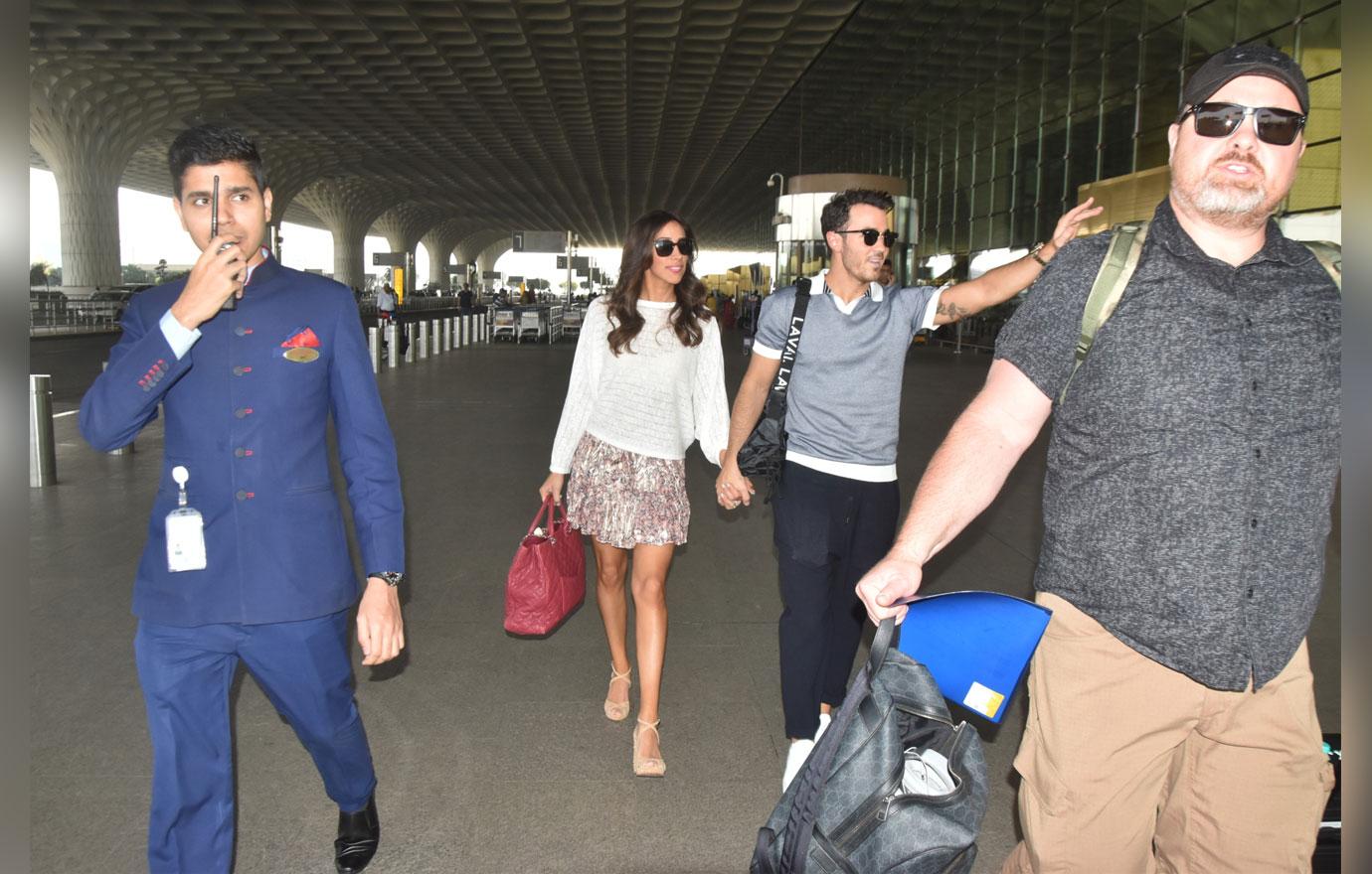 EXCLUSIVE: Kevin Jonas and wife seen arriving at Mumbai airport to head to Jodhpur for his brothers wedding