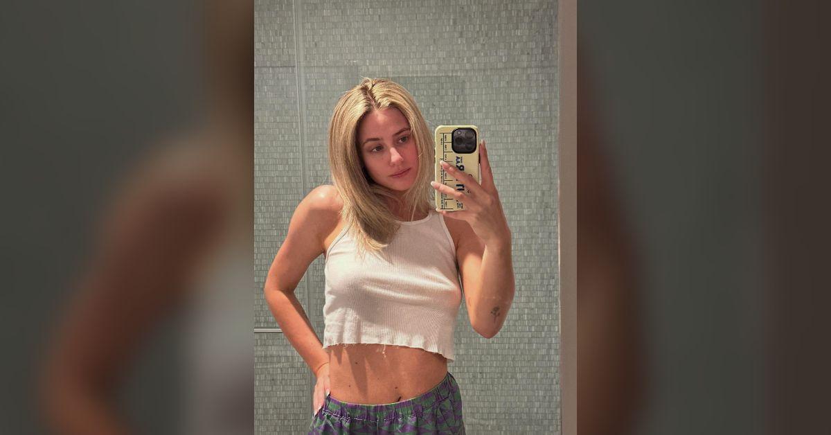 lili reinhart flaunts midriff braless tank top photos