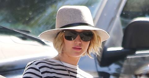 Jennifer Lawrence shows the photographers the middle finger through her new umbrella while visiting Rachel Zoe’s office in West Hollywood