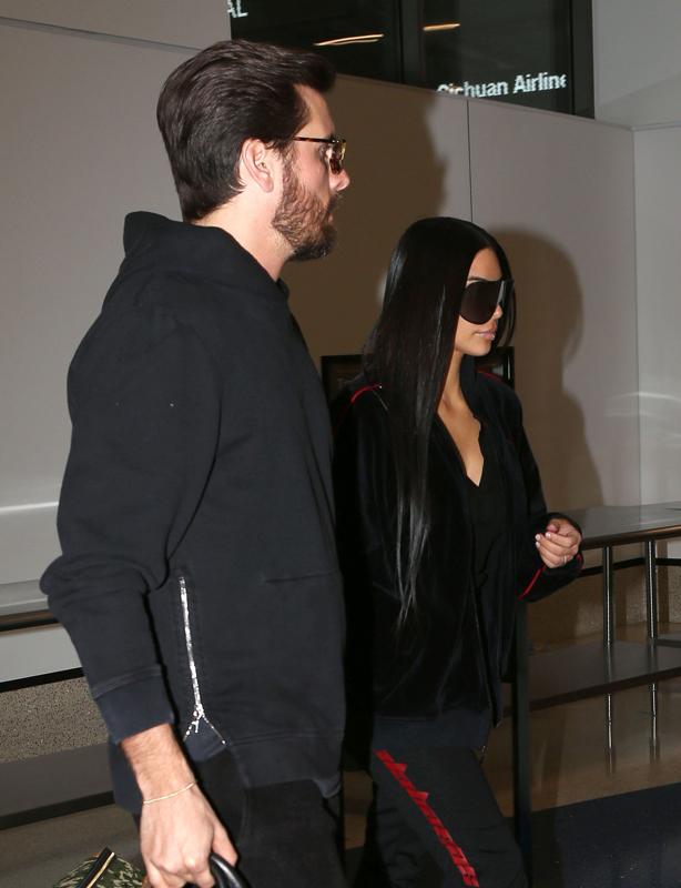 Kim Kardashian &amp; Scott Disick Departing On A Flight At LAX