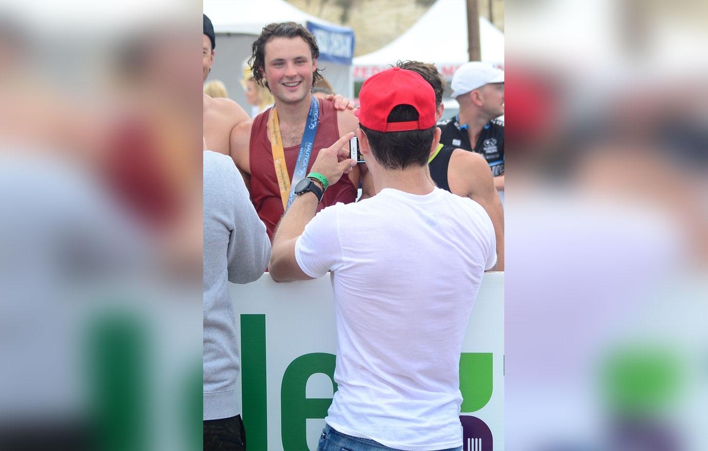 *EXCLUSIVE* Zac Efron greets his brother Dylan at the finish line of a Triathlon in Malibu