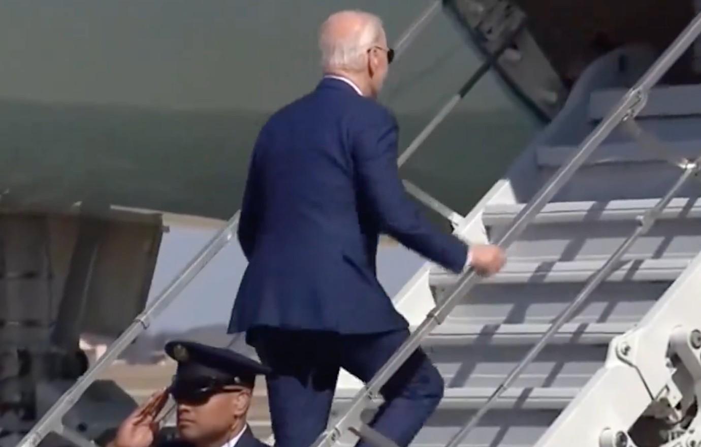 joe biden trips stairs