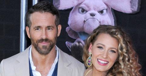 Ryan Reynolds Wearing a Suit With Blake Lively In a Yellow dress On a Red Carpet
