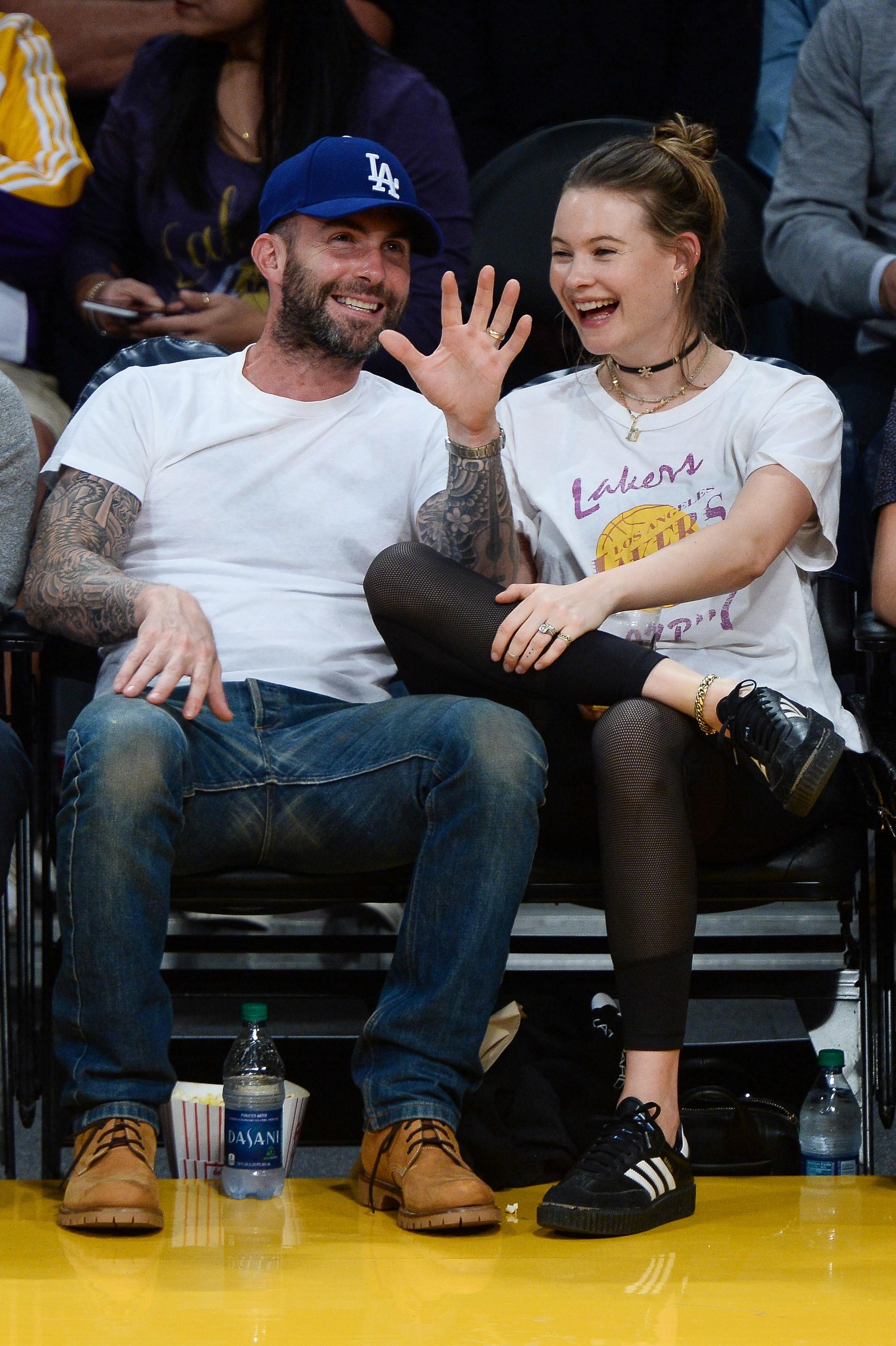 Adam Levine and Behati Prinsloo enjoy the Lakers vs. Warriors game