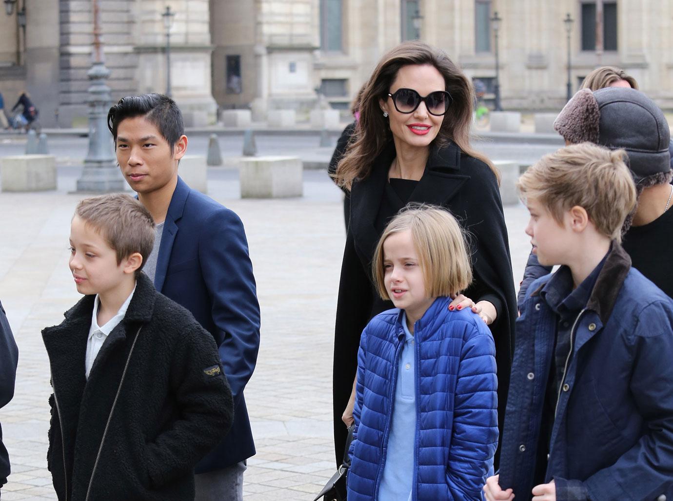 Angelina Jolie Walking With Her Children