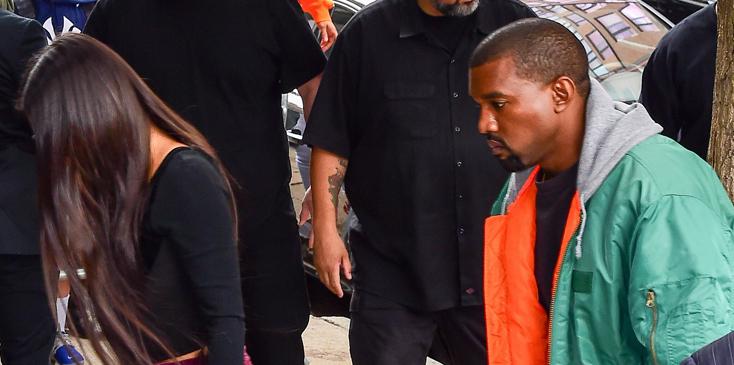 Kim Kardashian arrives at her Tribeca Airbnb apt escorted by Kanye and dozens of bodyguards