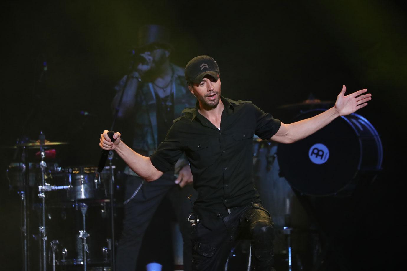 Enrique Iglesias Brags About Sex Life After Kissing Another Woman