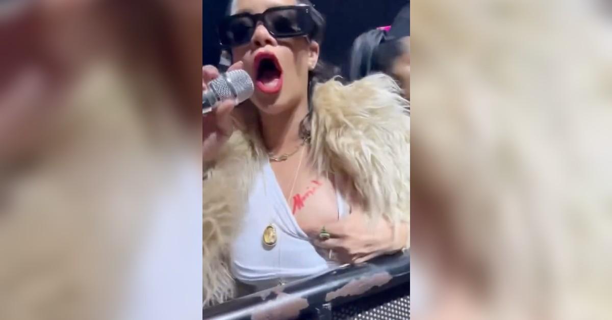 mariah carey signs rihanna chest christmas concert watch