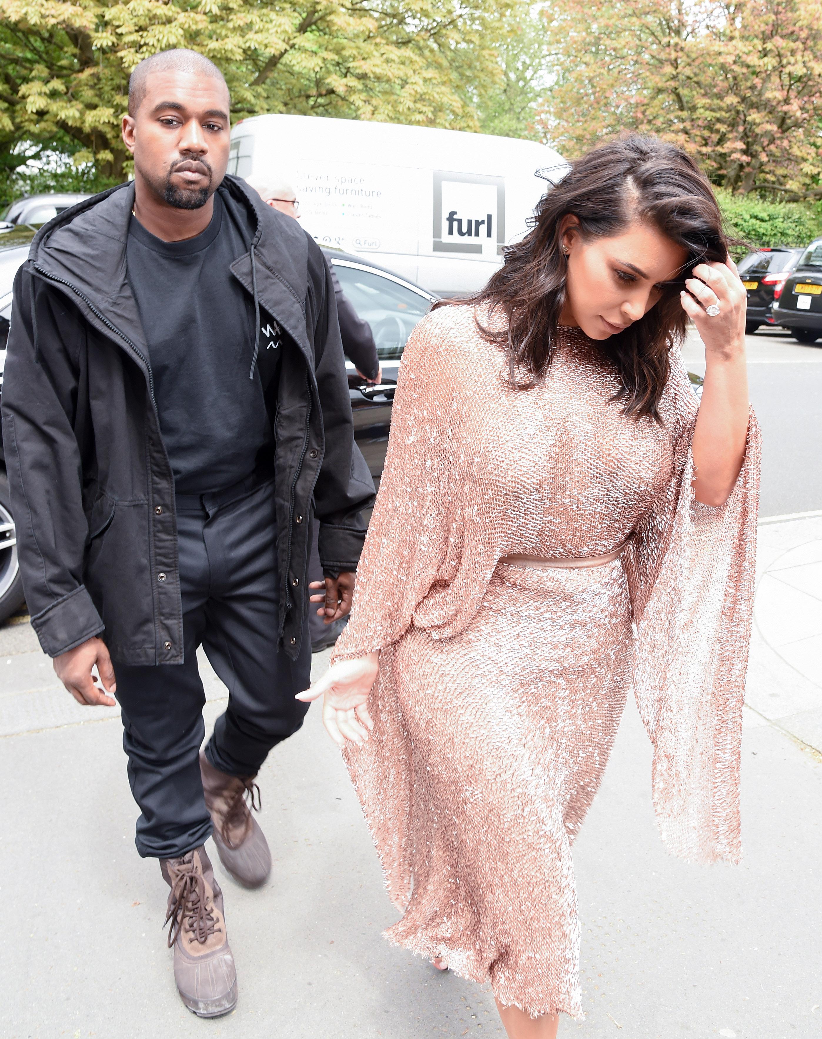 Kim and Kanye arrive at the Vogue Festival in London