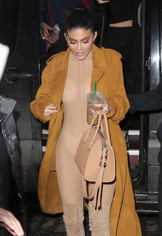 Kylie Jenner opts for a sheer nude body suit while heading to dinner with Tyga