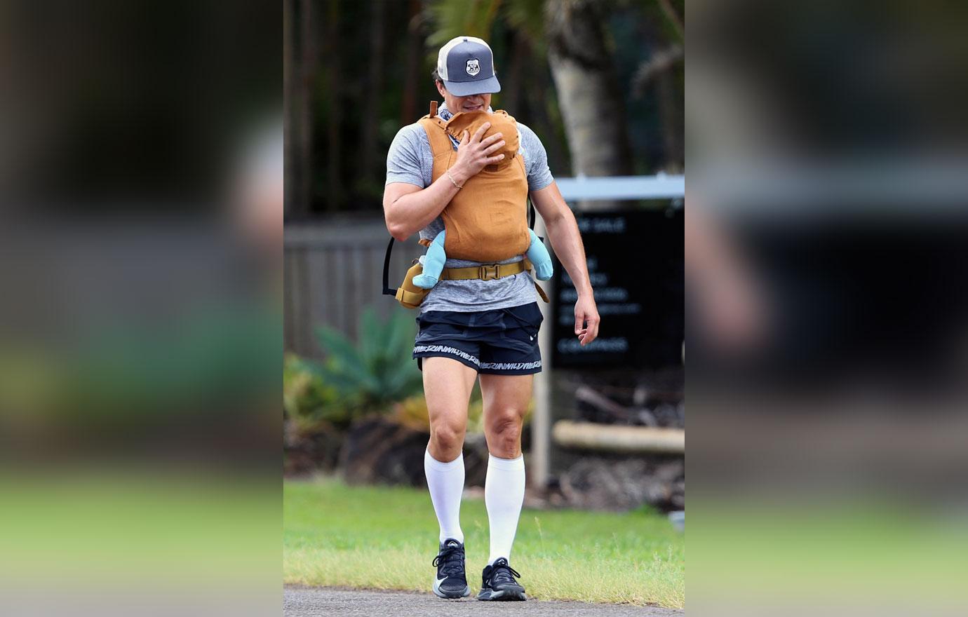 orlando bloom carries daisy dove bloom chest carrier on a hike