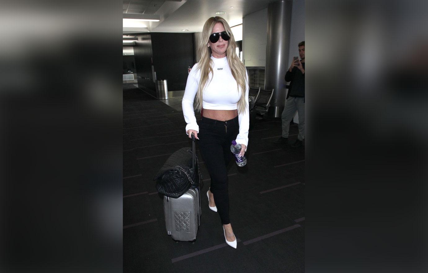 Kim Zolciak and her husband Kroy Biermann depart LAX