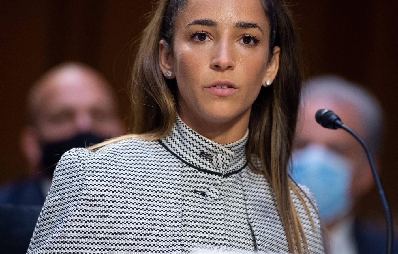 gymnast aly raisman hospitalized twice scary stroke symptoms paralysis