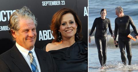 Sigourney Weaver And Jim Simpson In The Surf