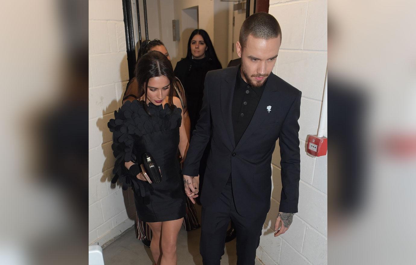 Liam Payne and Cheryl Cole look downbeat following Brit Awards