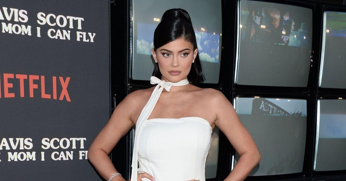 kylie jenner promotes kylie cosmetics products second child wolf travis scott