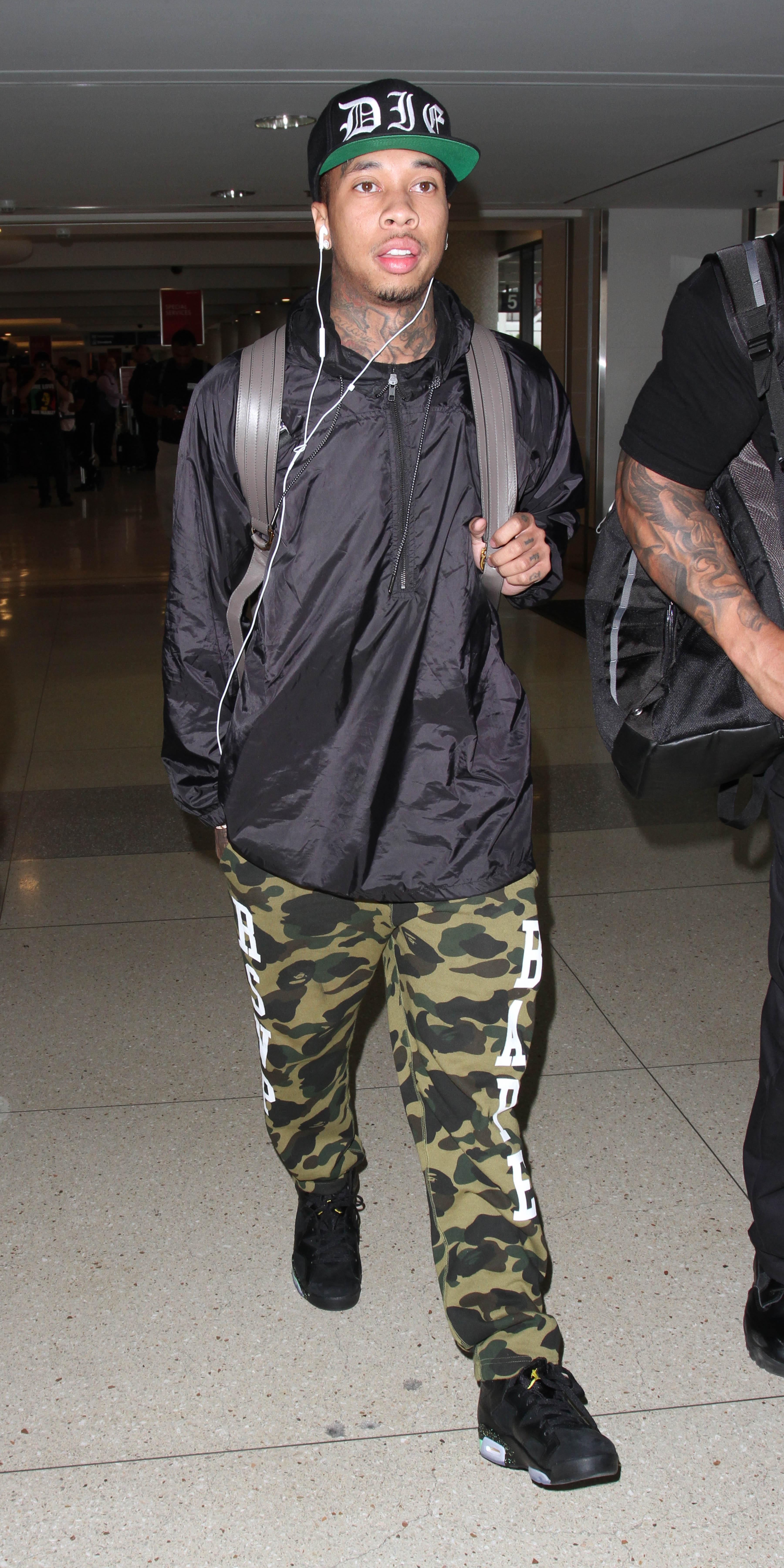 Tyga is spotted at LAX amidst reports Kylie Jenner wants to marry him eventually.