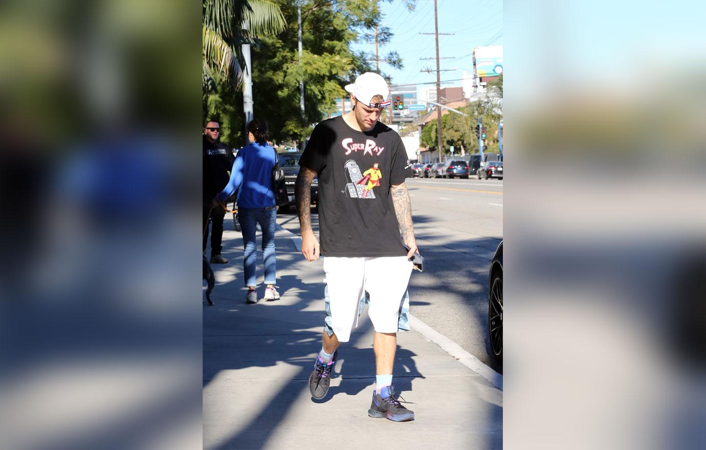 Justin Bieber is all smiles as he leaves the gym