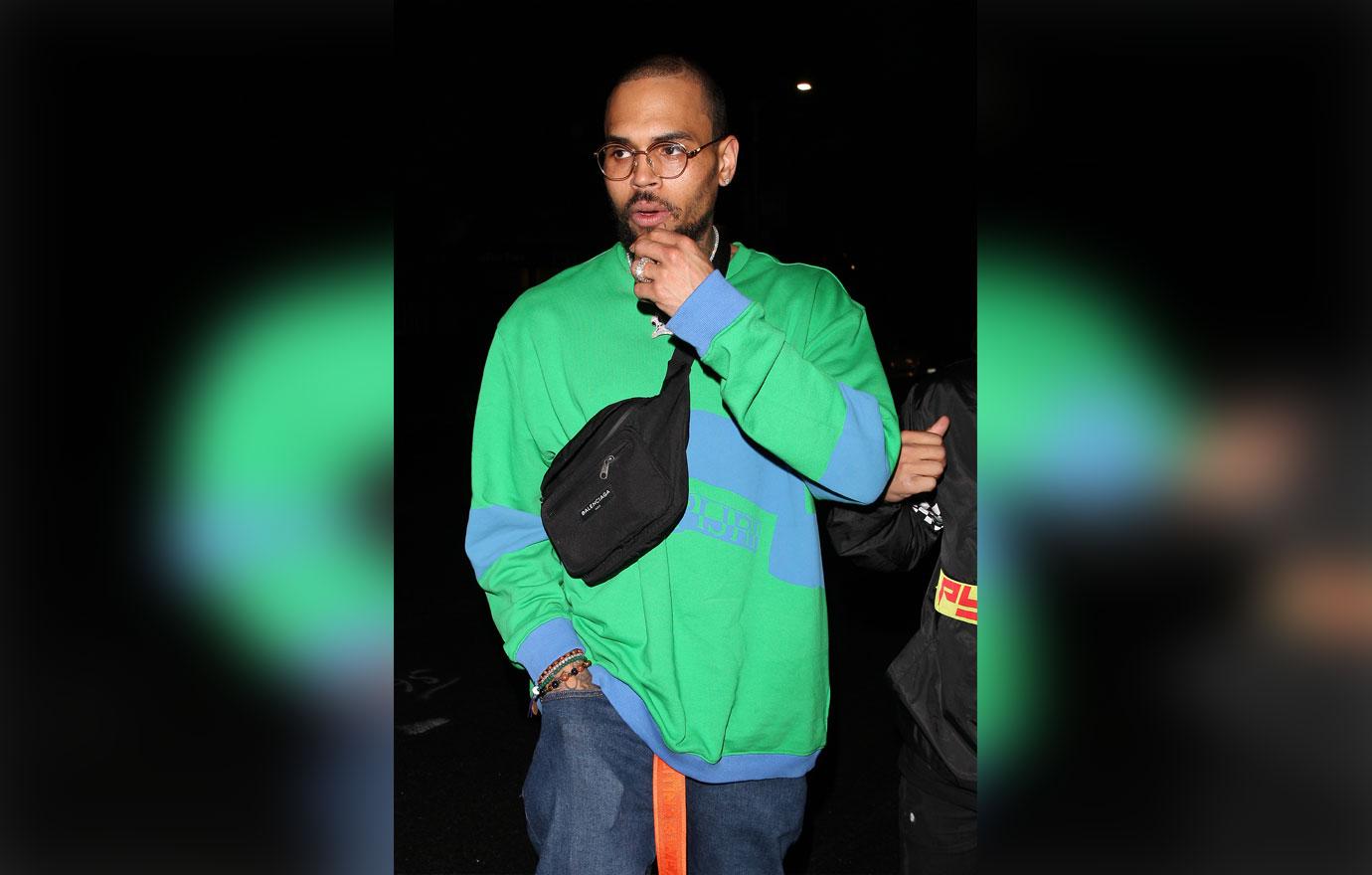 Singer Chris Brown is spotted going to the Poppy club with his friends