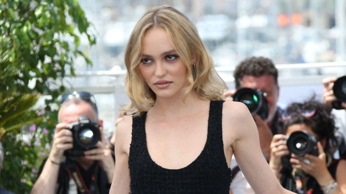 image of Her pastel pink bikini featured delicate chain details along the hips.