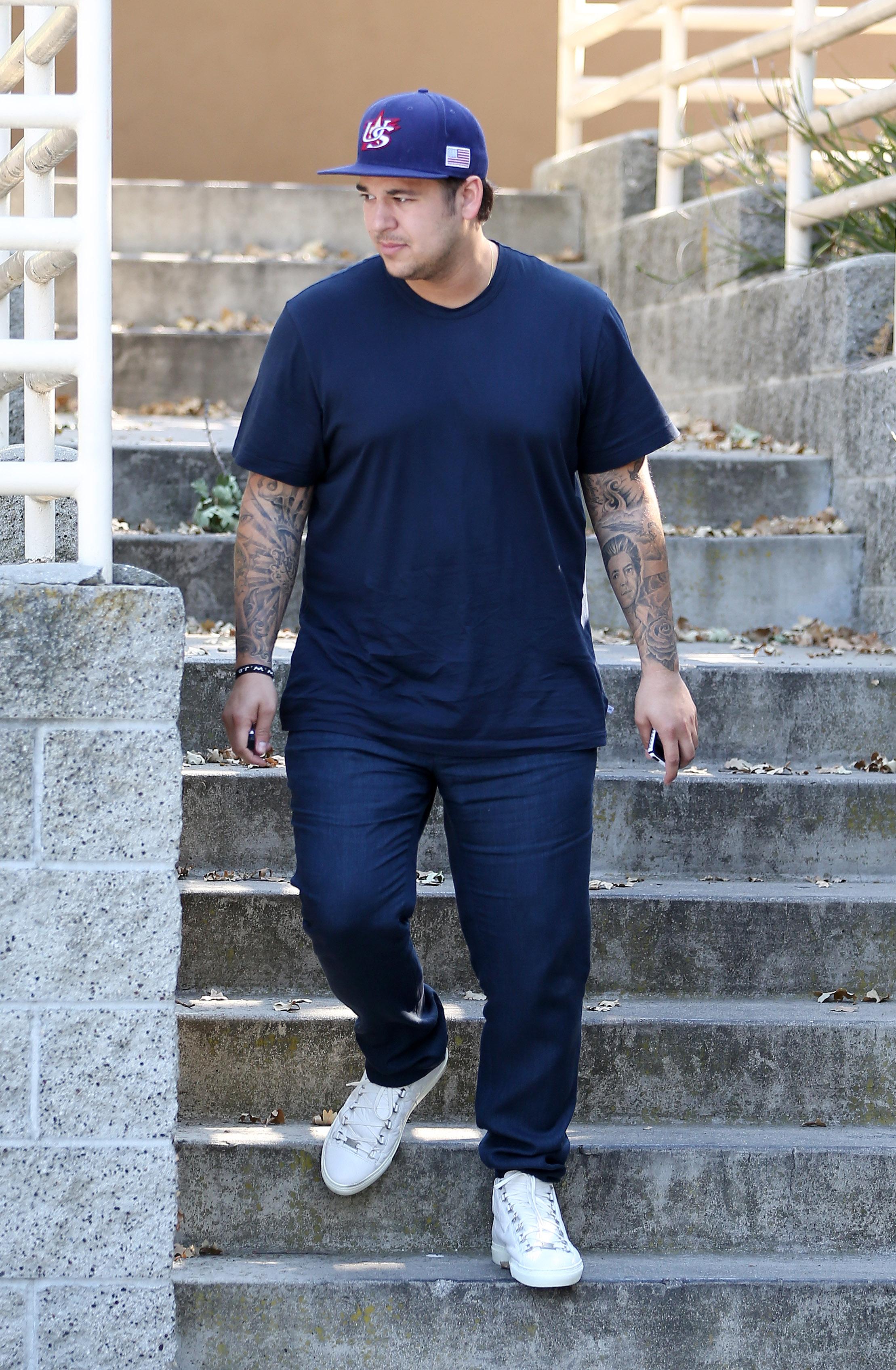 Rob Kardashian not looking very happy as he finished up filming Keeping up with the Kardashians