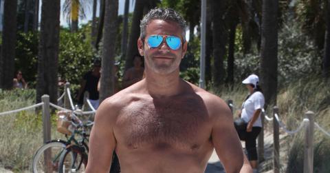 Talk show host Andy Cohen enjoys a day of tanning on Miami Beach