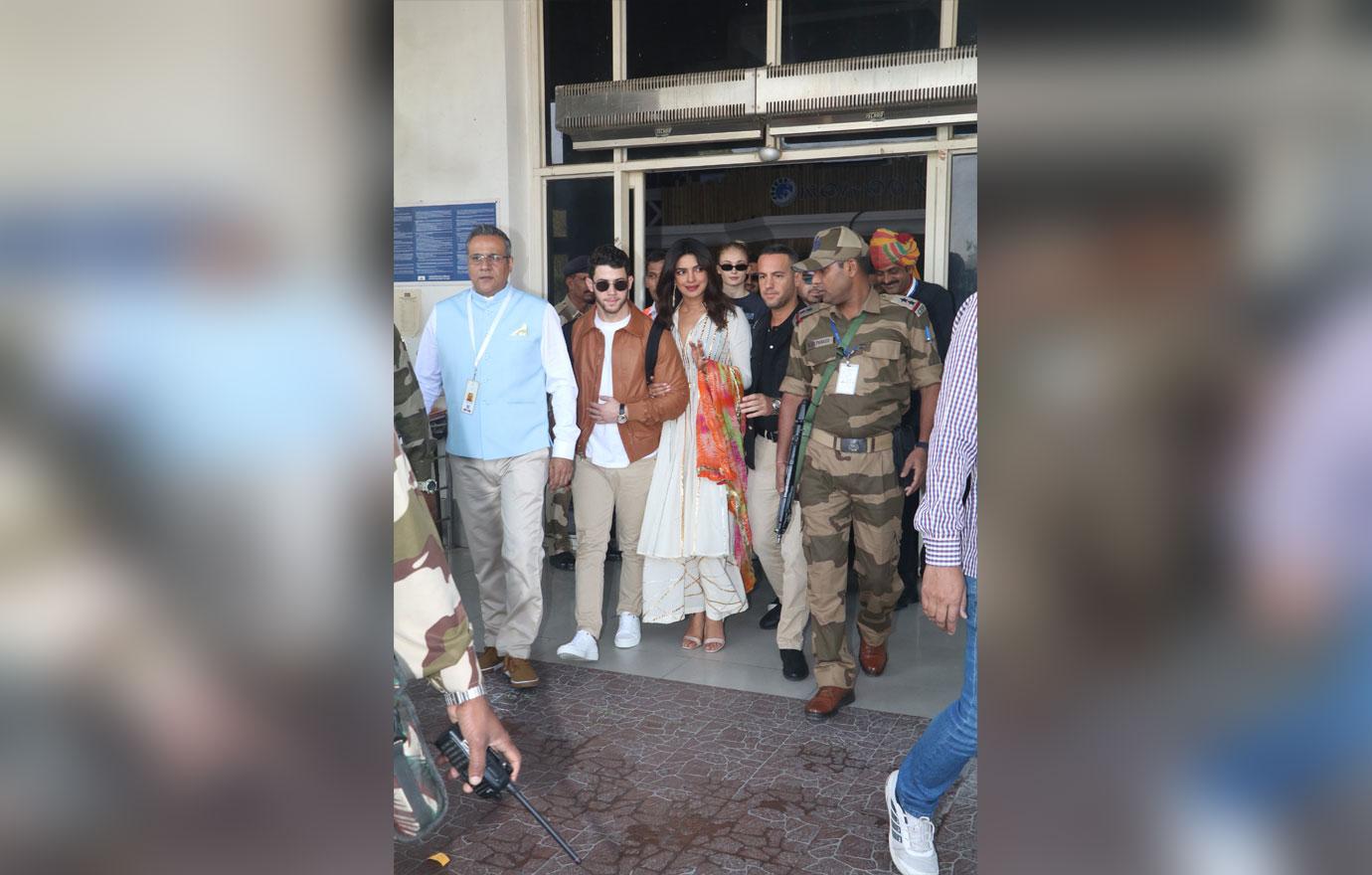 Nick Jonas and Priyanka Chopra and guests at airport