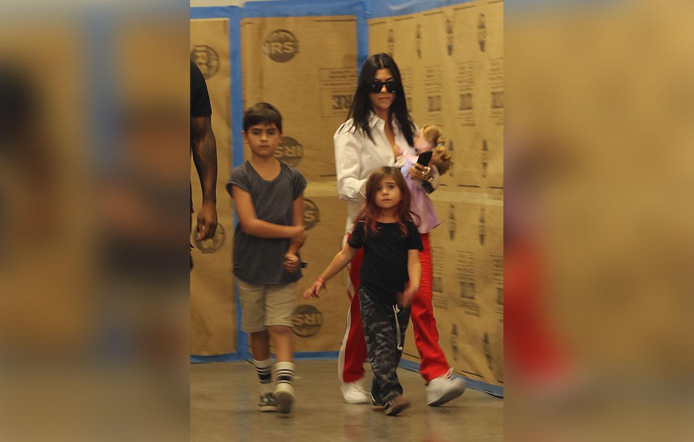 Kourtney Kardashian heads out from art class with Mason and Penelope