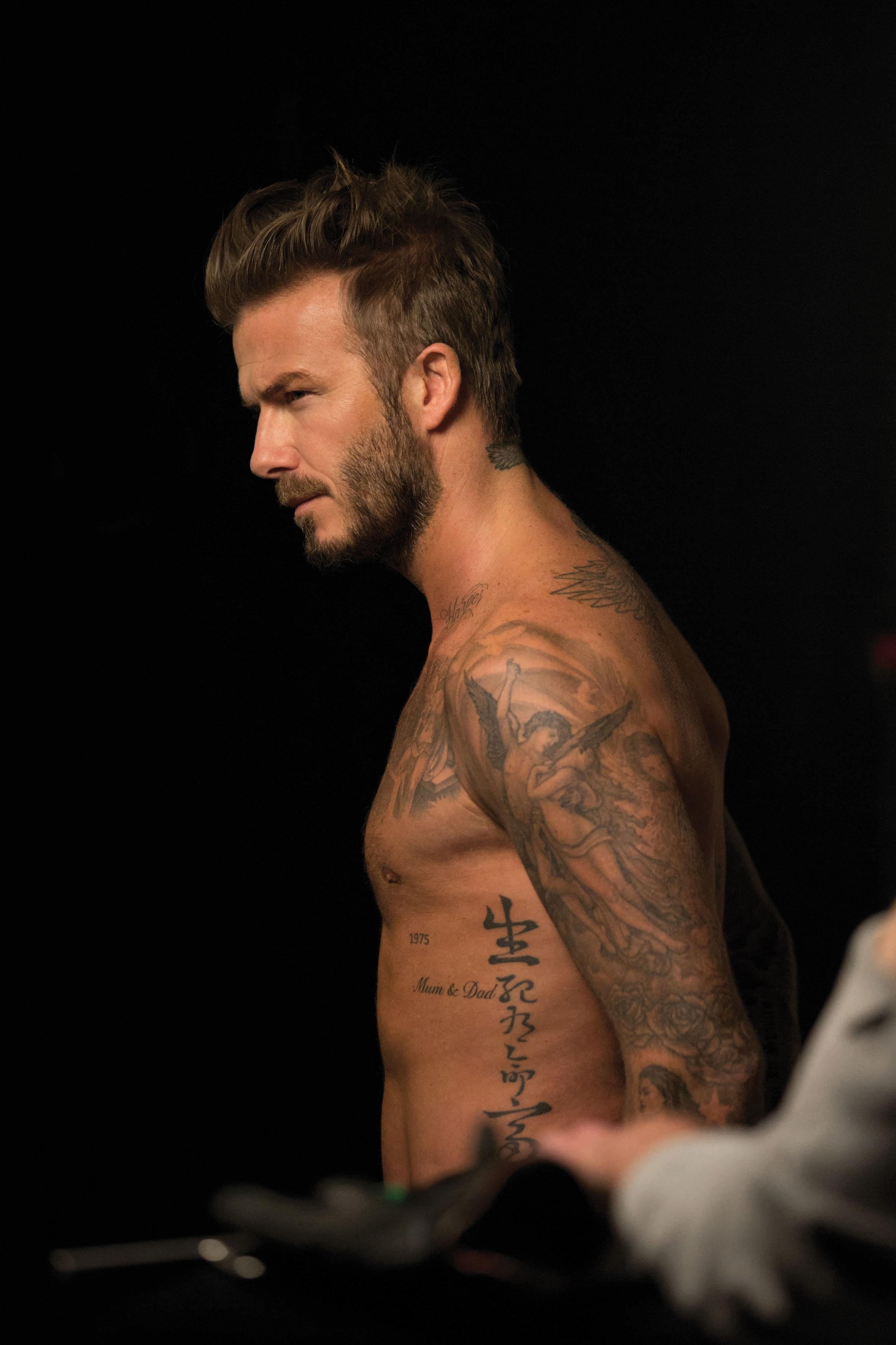 David Beckham goes shirtless in behind the scenes shots from his new fragrance campaign