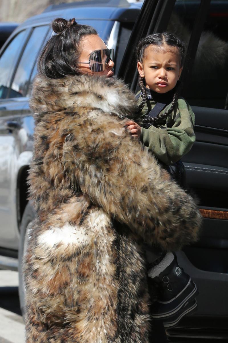 Kim and family arrive for some snow mobile fun in the snowy hills of Vail