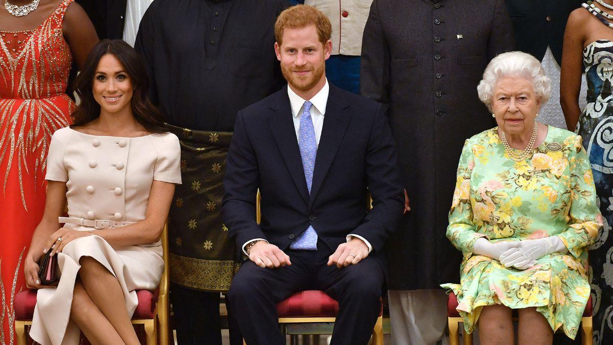image of prince harry and meghan markle and queen